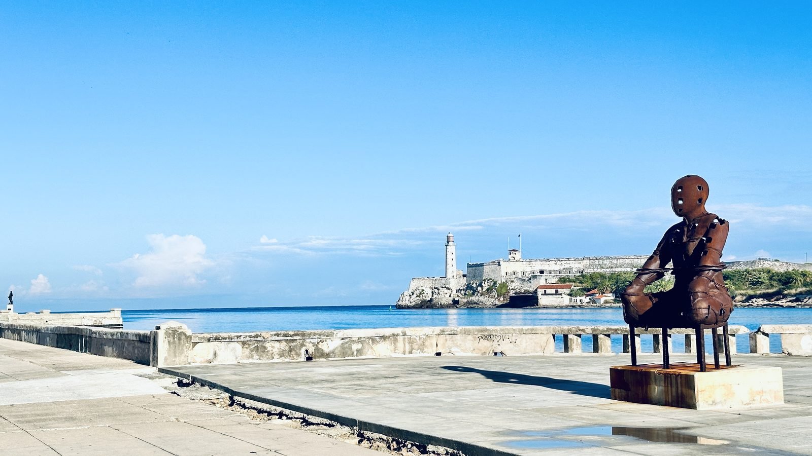 The Malecón sea wall in Havana, with the Morro fortress across the bay